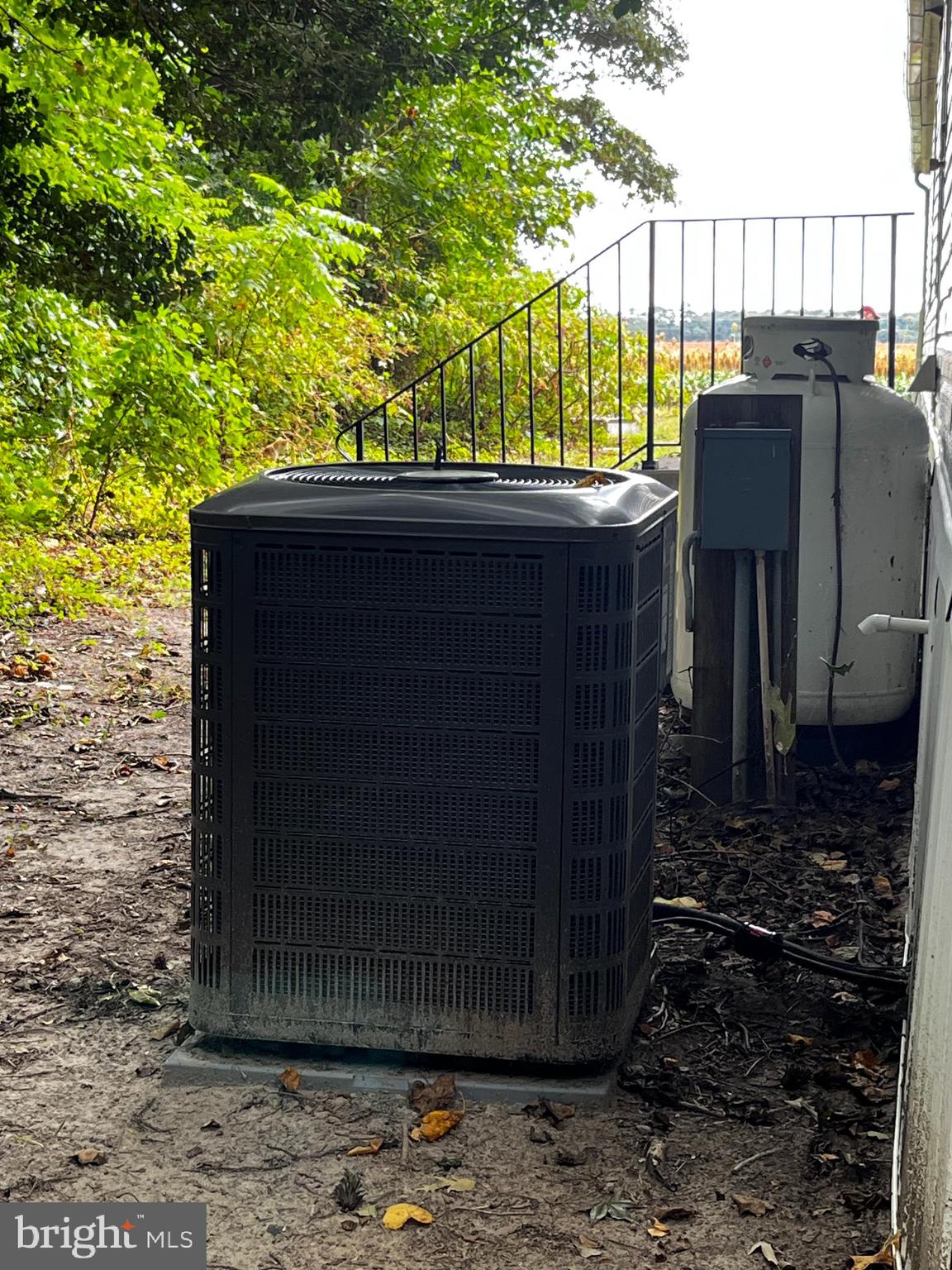 11240 Curt Dogg Road Lincoln, DE 19960 - Photo 13 of 14 a table and chairs sitting in a backyard