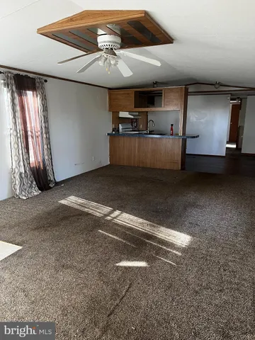 a view of a livingroom with furniture