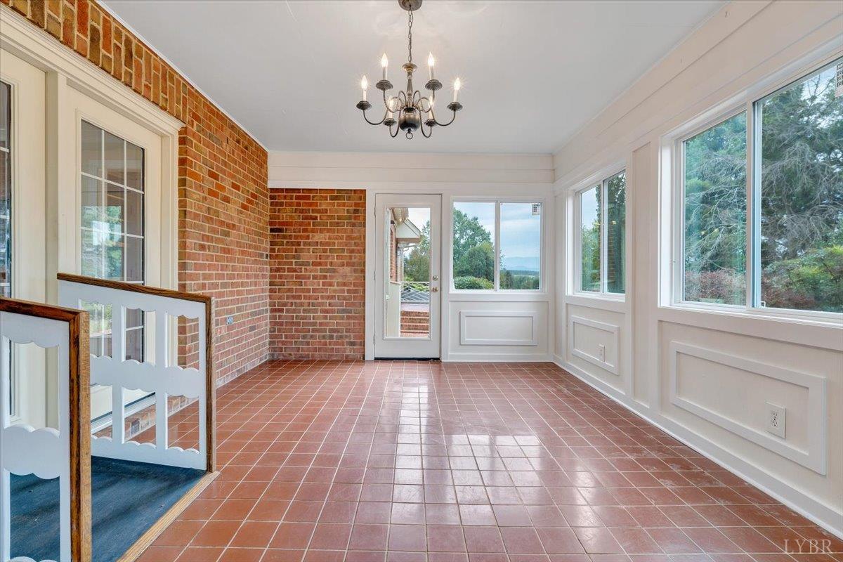 105 North Branch Road Bedford, VA 24523 - Photo 34 of 80 a view of a livingroom with wooden floor and windows