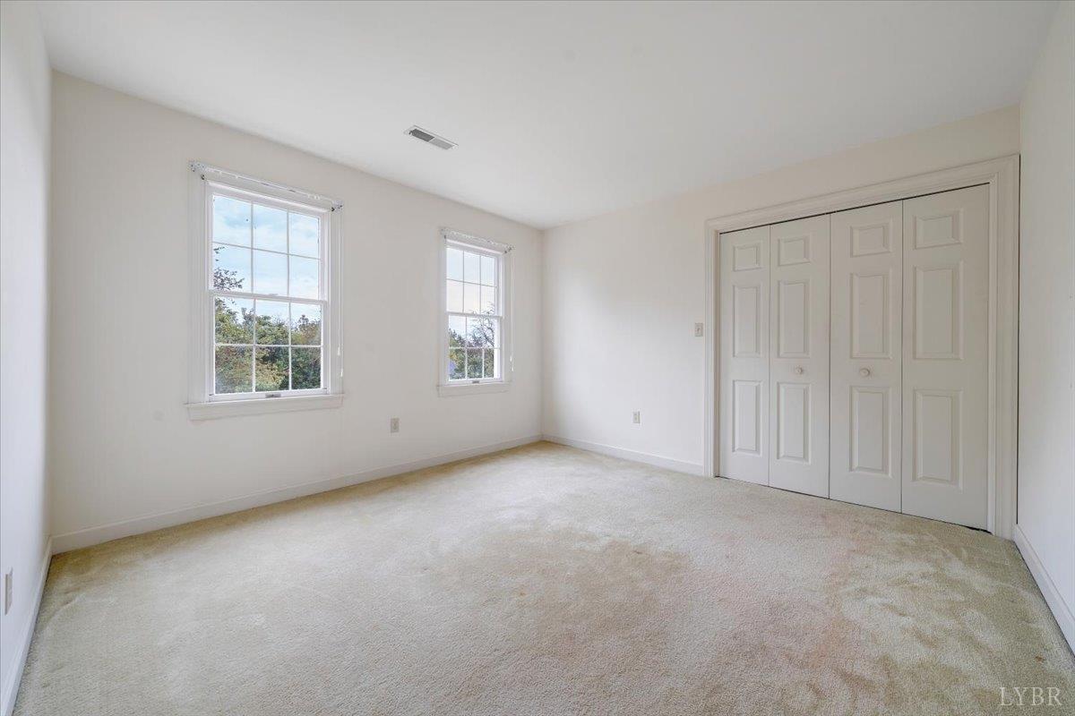 105 North Branch Road Bedford, VA 24523 - Photo 43 of 80 an empty room with windows
