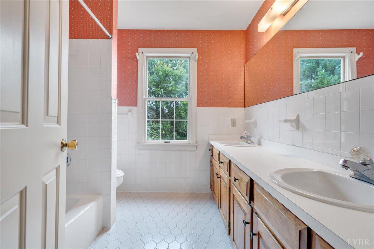 105 North Branch Road Bedford, VA 24523 - Photo 44 of 80 a bathroom with a sink and a bathtub