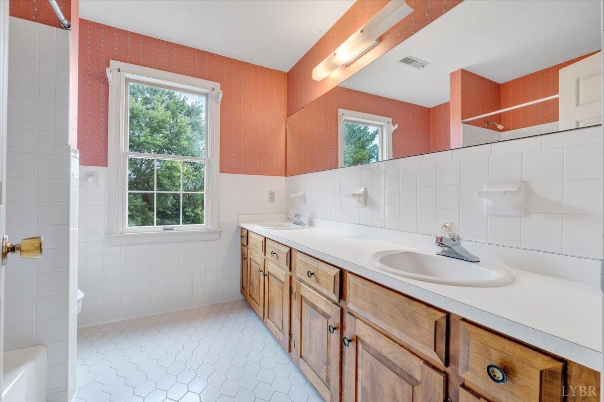 105 North Branch Road Bedford, VA 24523 - Photo 45 of 80 a bathroom with a sink and a window