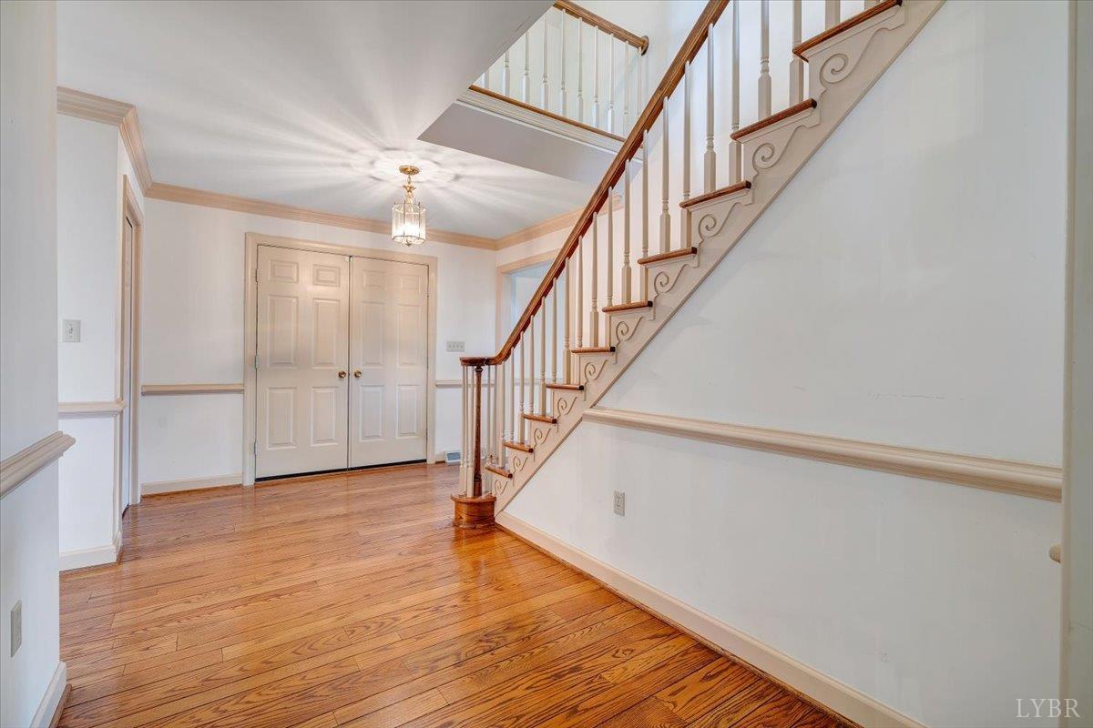 105 North Branch Road Bedford, VA 24523 - Photo 5 of 80 a view of staircase with wooden floor and white walls