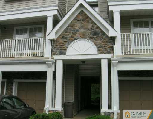 273 Prestwick Way Edison, NJ 08820 - Photo 1 of 6 a view of a house with a balcony