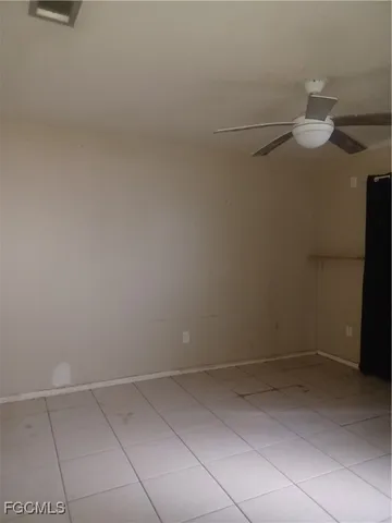 a view of a room with an empty space