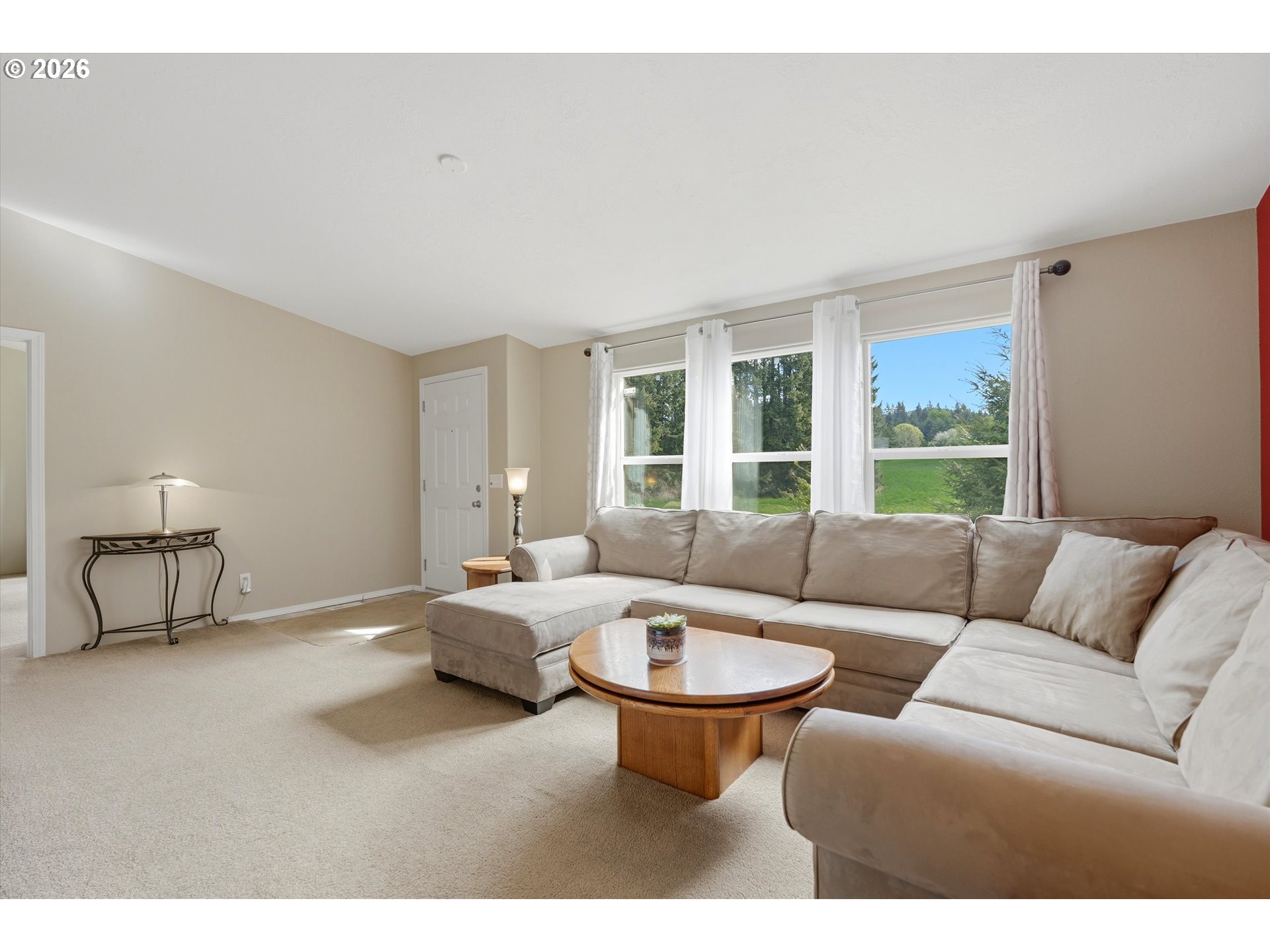 20270 Northwest Pihl Road Banks, OR 97106 - Photo 15 of 47 a living room with furniture and a large window