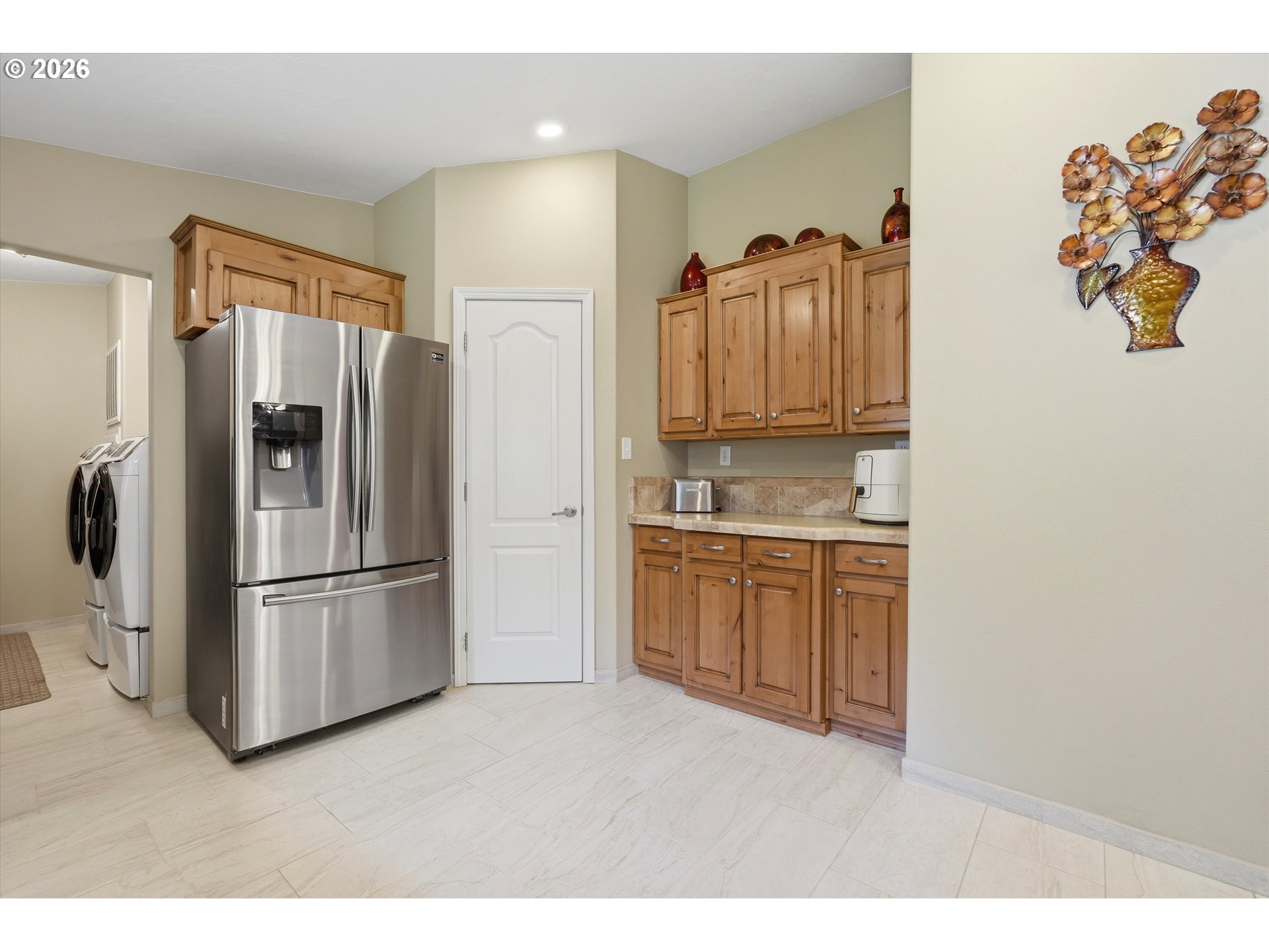 20270 Northwest Pihl Road Banks, OR 97106 - Photo 19 of 47 a kitchen with a refrigerator and a sink