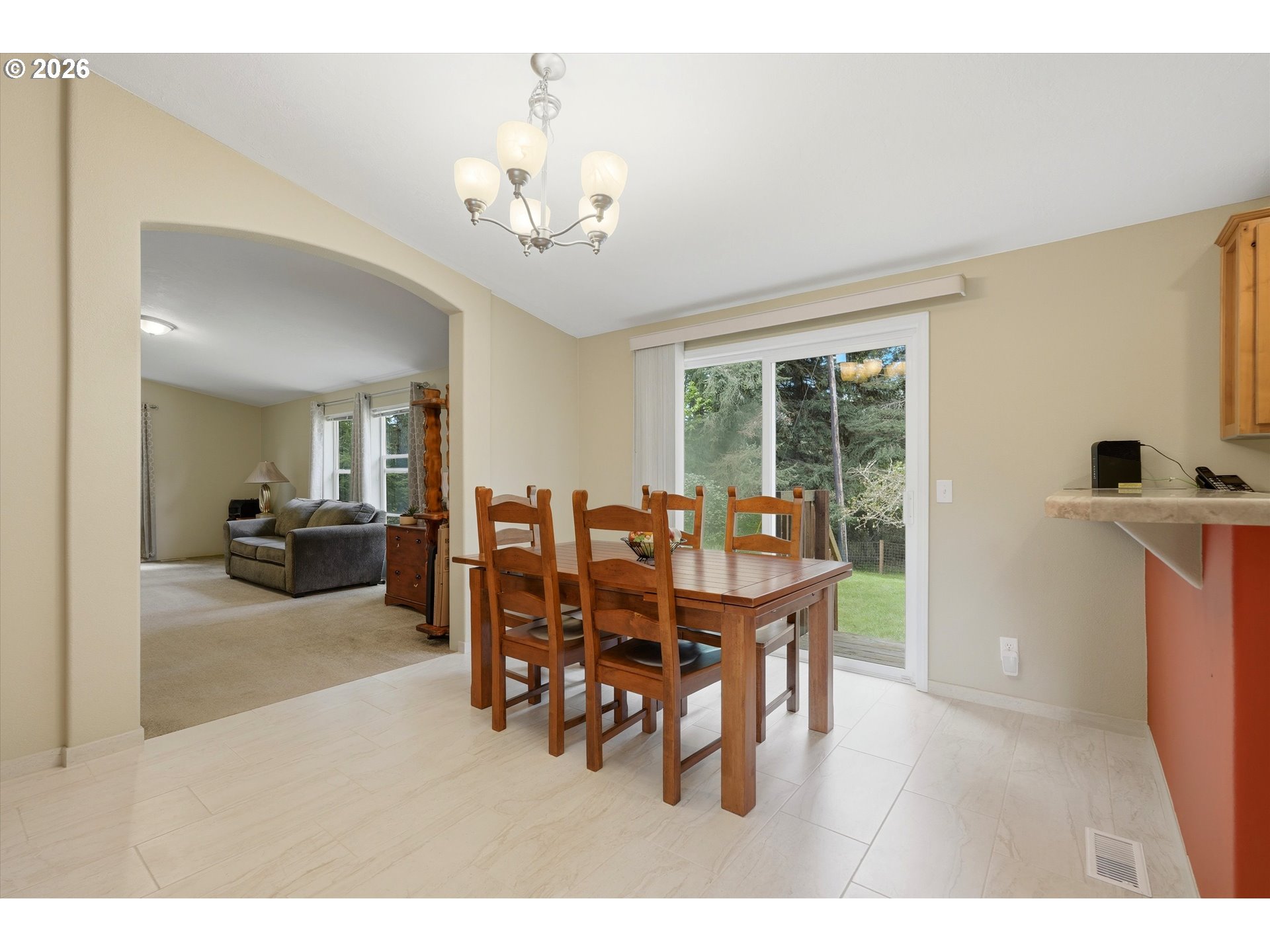 20270 Northwest Pihl Road Banks, OR 97106 - Photo 21 of 47 a dining room with furniture a chandelier and window