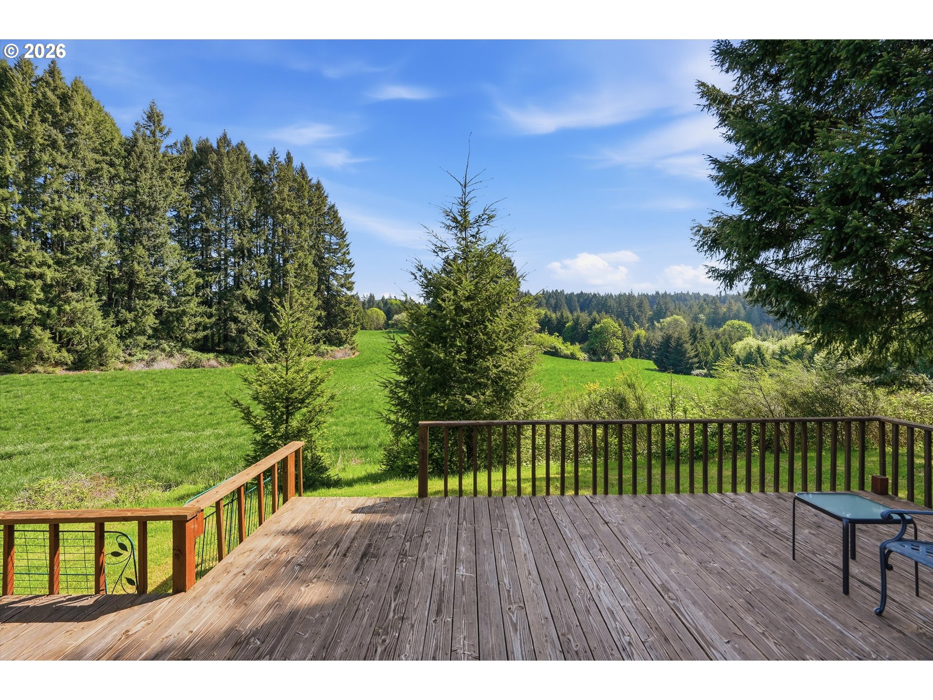 20270 Northwest Pihl Road Banks, OR 97106 - Photo 10 of 47 a view of a wooden deck with a yard