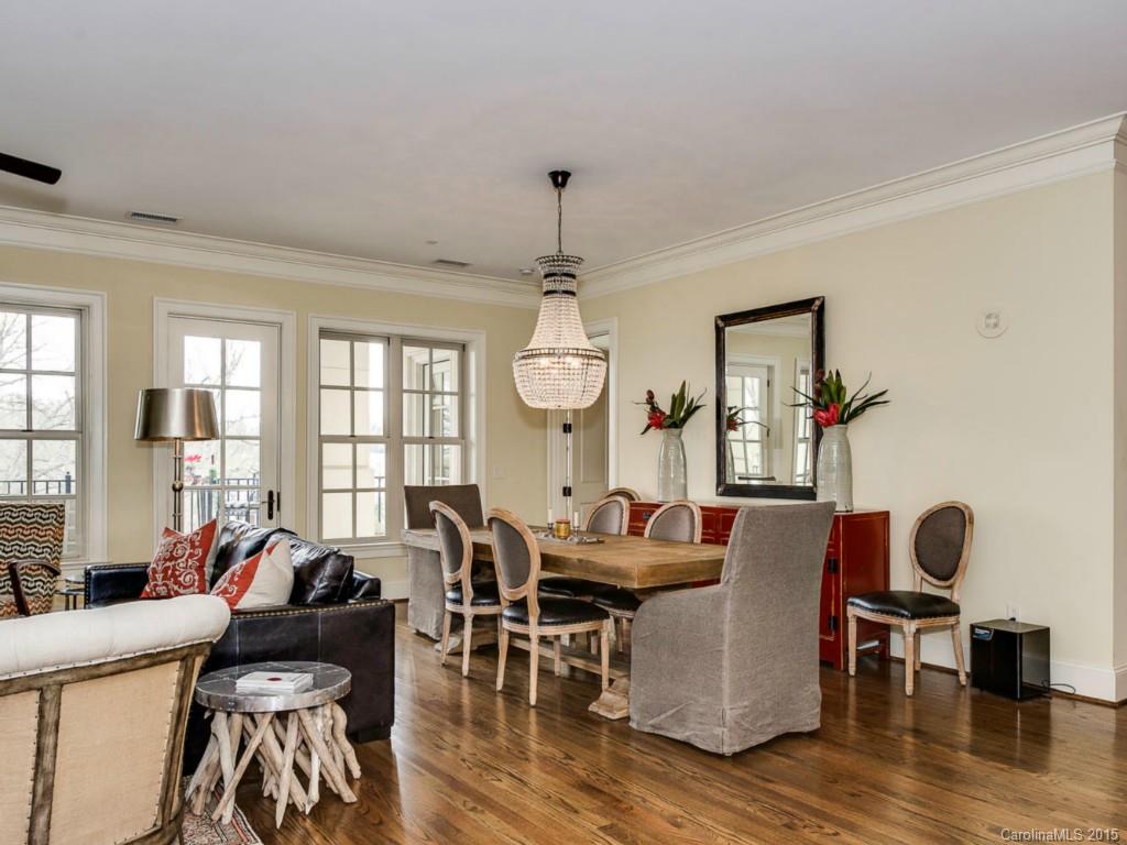 2823 Providence Road, Unit 145 Charlotte, NC 28211 - Photo 2 of 24 a living room with furniture a window and wooden floor