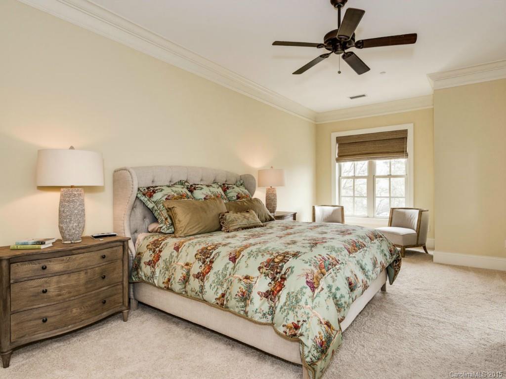 2823 Providence Road, Unit 145 Charlotte, NC 28211 - Photo 14 of 24 a bedroom with a bed a window and a lamp
