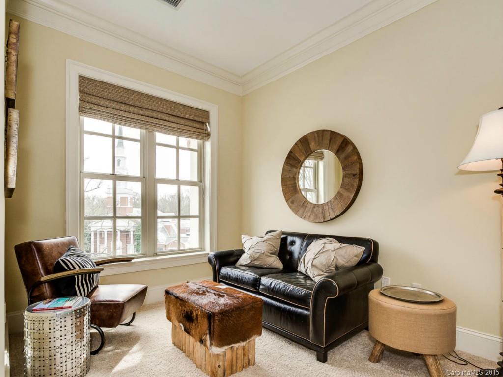 2823 Providence Road, Unit 145 Charlotte, NC 28211 - Photo 15 of 24 a living room with furniture and a large window