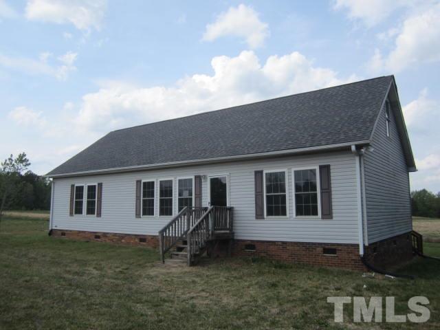 728 Woodys Store Road Roxboro, NC 27574 - Photo 2 of 15 a house view with a backyard space