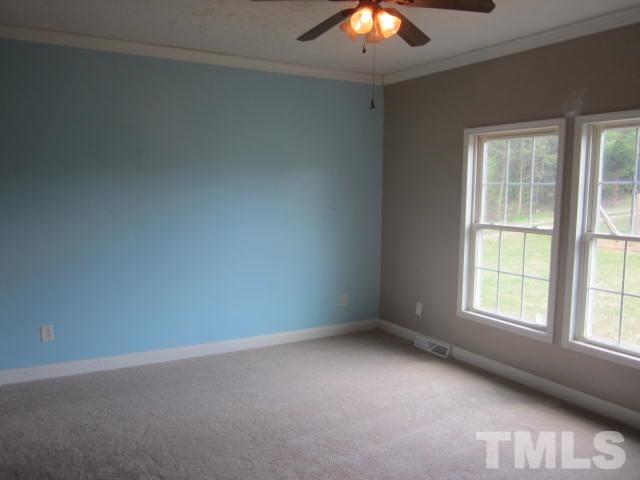 728 Woodys Store Road Roxboro, NC 27574 - Photo 10 of 15 an empty room with a window