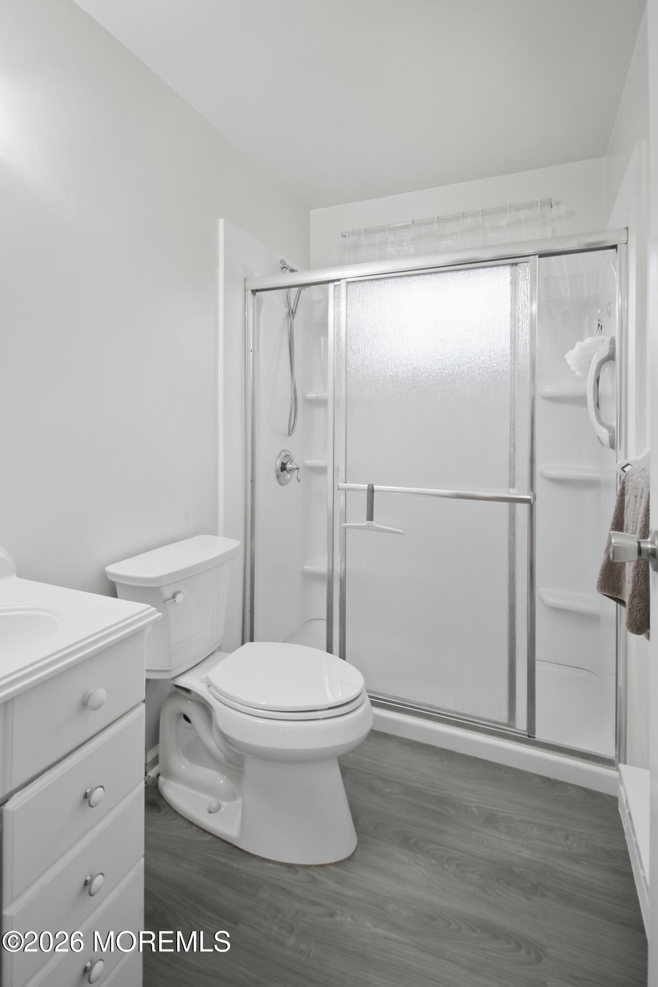22 A Roosevelt City Road Whiting, NJ 08759 - Photo 13 of 18 a bathroom with a toilet a sink and a shower