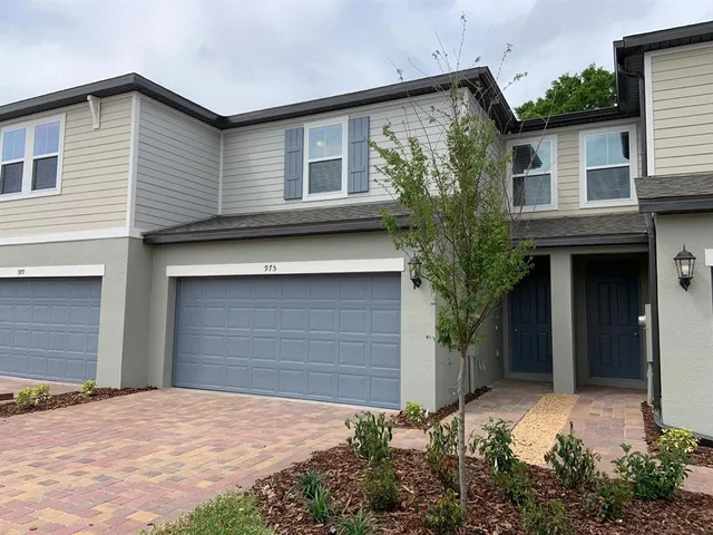 a front view of house with yard