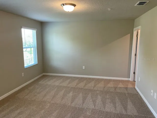 an empty room with closet