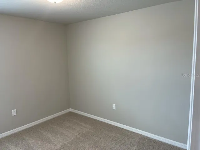 a kitchen with a sink and window