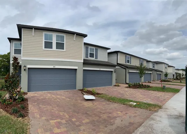 a front view of house with yard