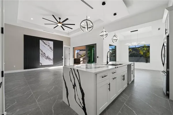 a view of an entryway with a chandelier