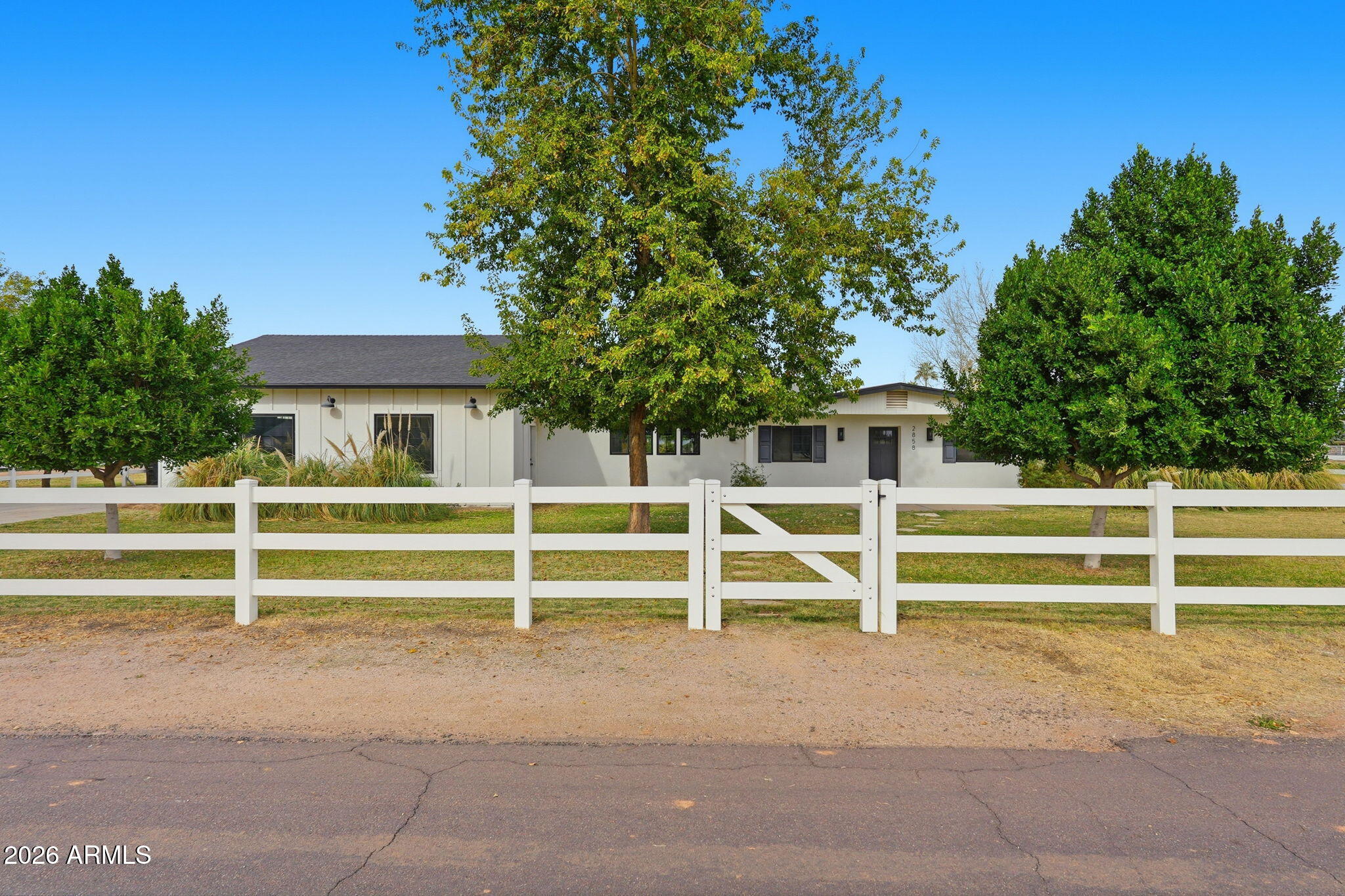 2858 East Redfield Road Gilbert, AZ 85234 - Photo 13 of 60 a view of a house with a backyard