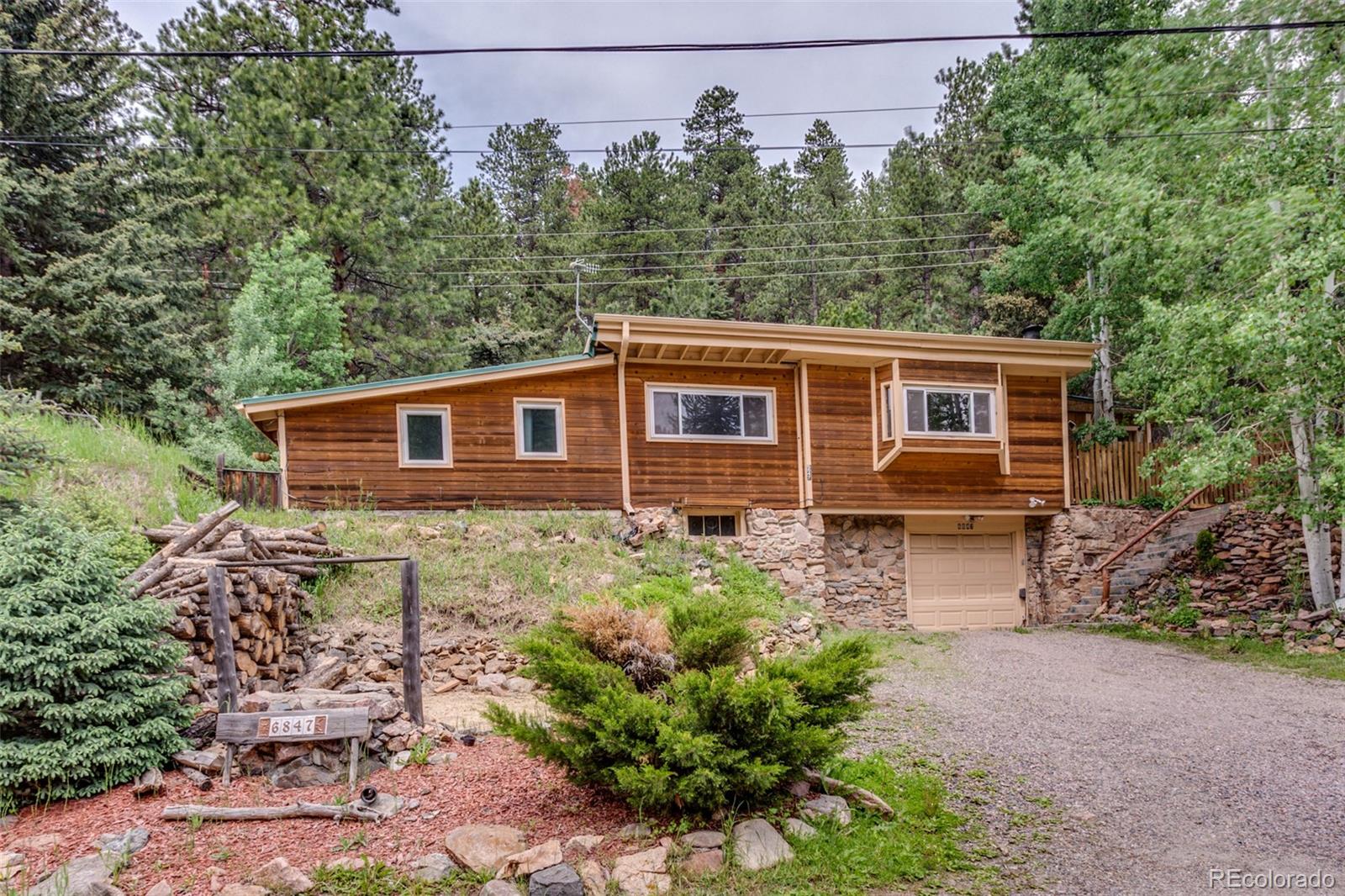 6847 South Brook Forest Road Evergreen, CO 80439 - Photo 1 of 32 Gallery Image 1
