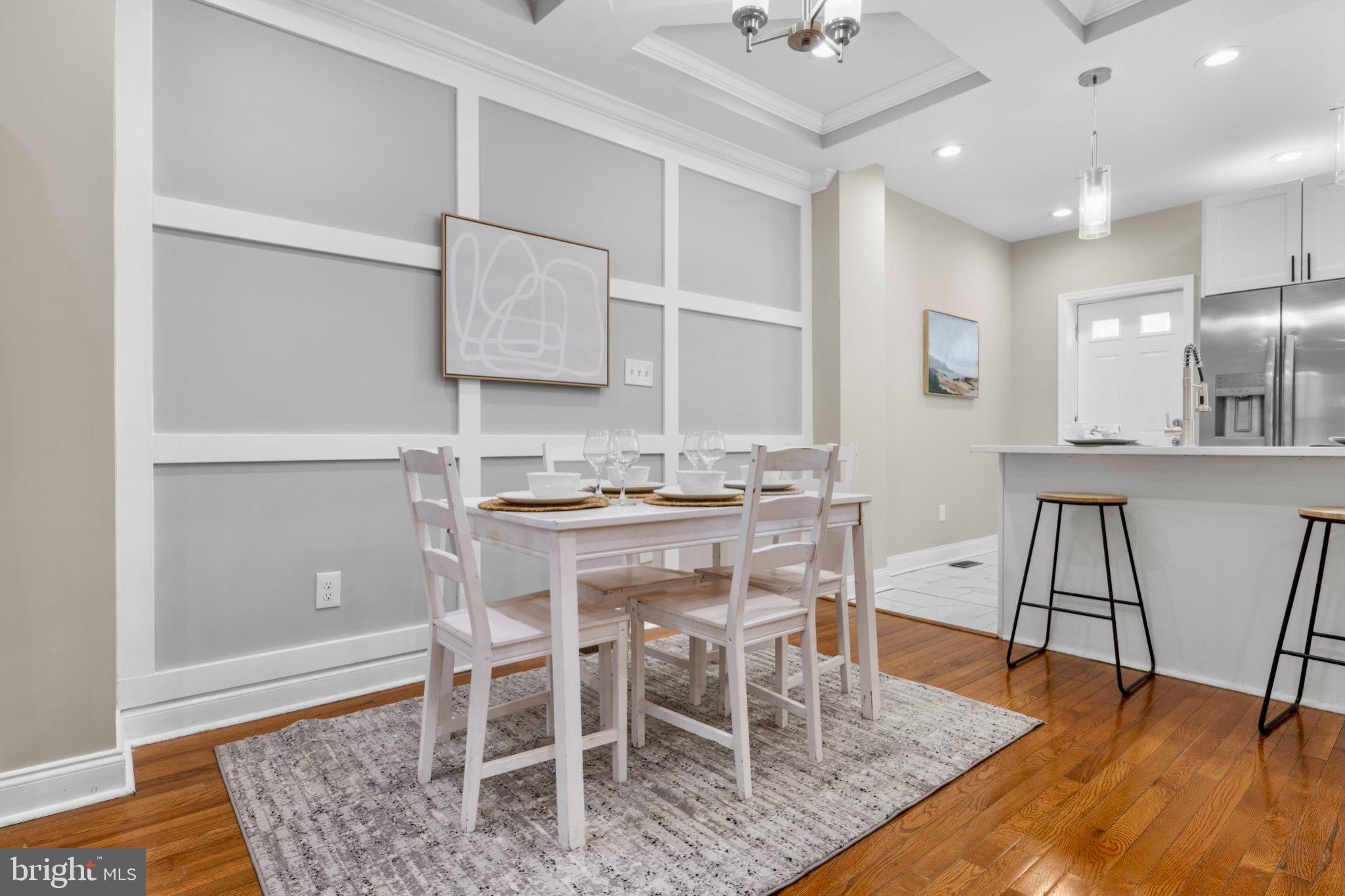 145 North Monastery Avenue Baltimore, MD 21229 - Photo 4 of 45 Elegant dining space with modern charm.