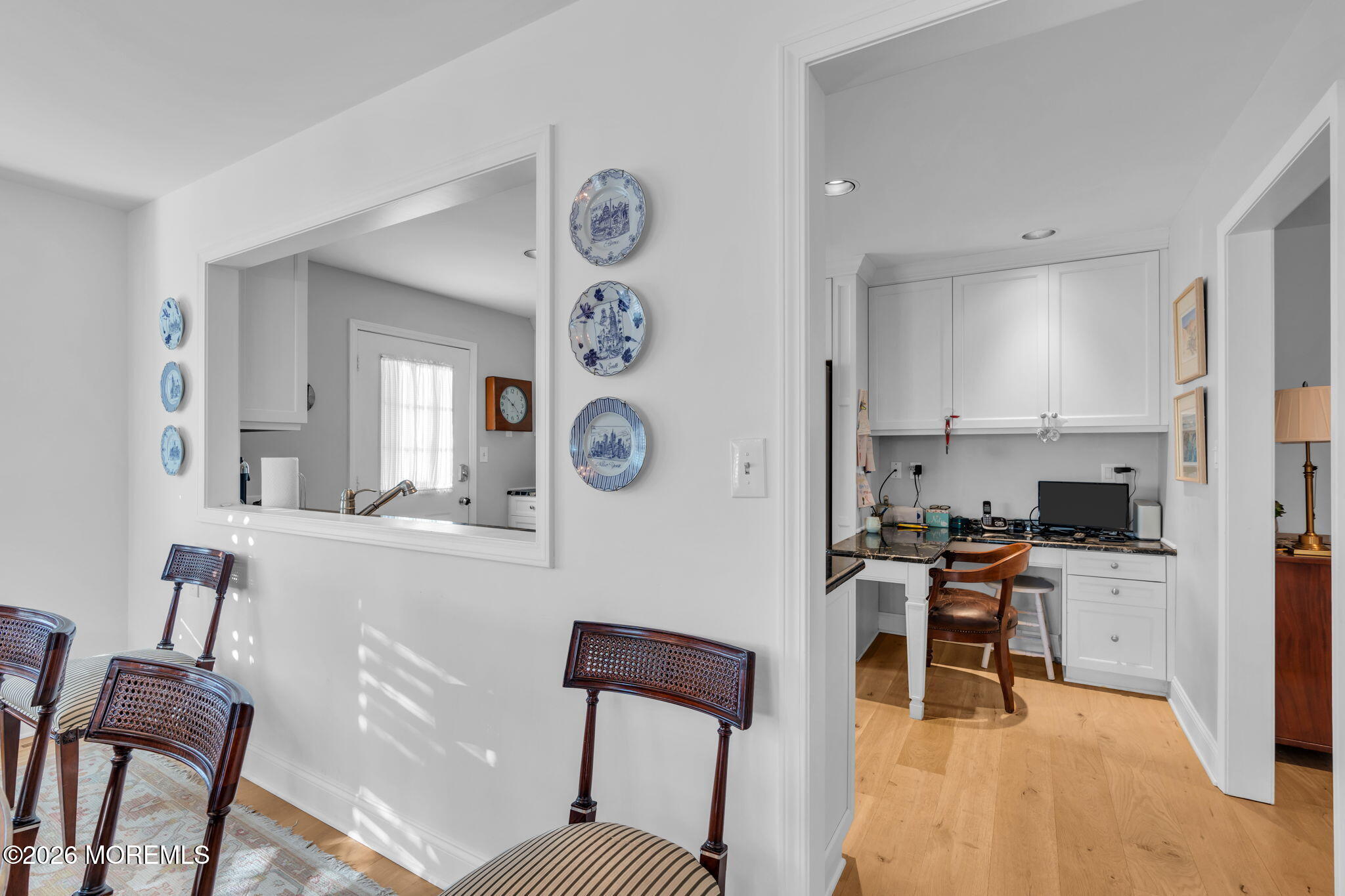 97 Bay Point Harbour Point Pleasant, NJ 08742 - Photo 11 of 54 a living room with furniture a clock on wall and a window