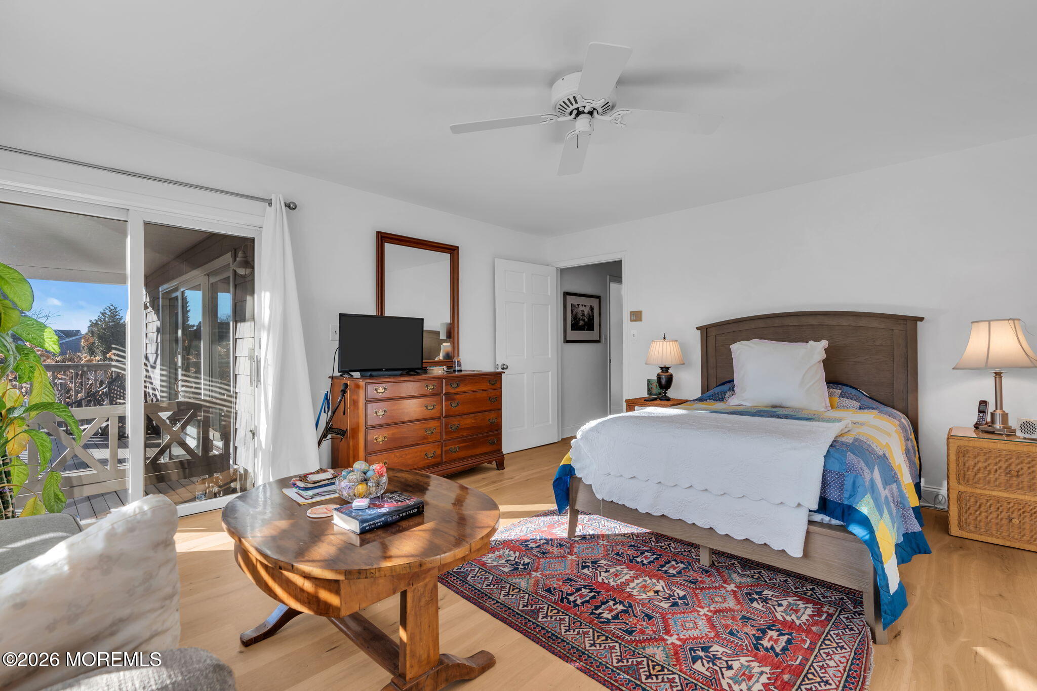 97 Bay Point Harbour Point Pleasant, NJ 08742 - Photo 25 of 54 a bedroom with a bed and wooden floor