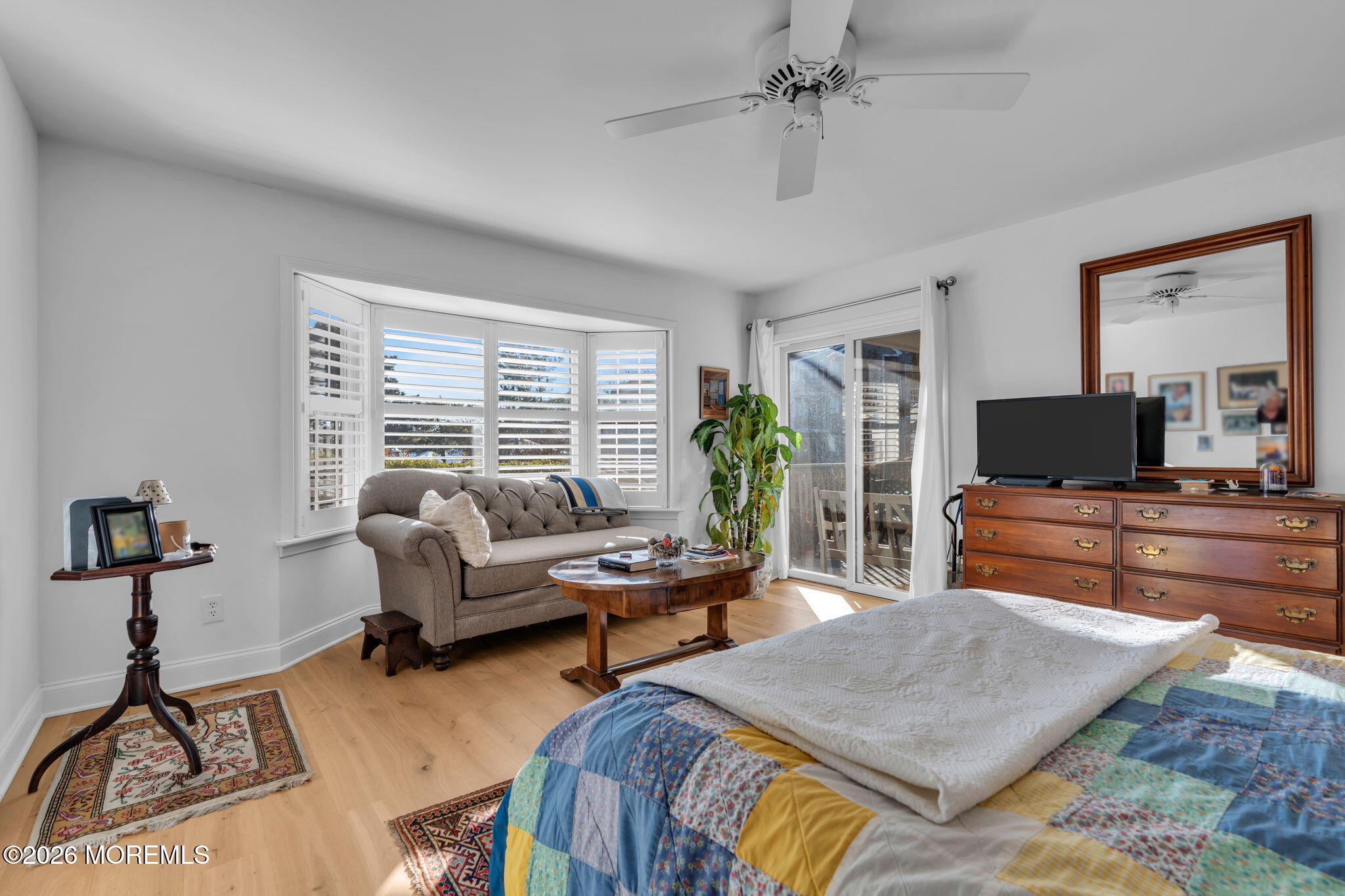 97 Bay Point Harbour Point Pleasant, NJ 08742 - Photo 26 of 54 a bedroom with furniture and a flat screen tv