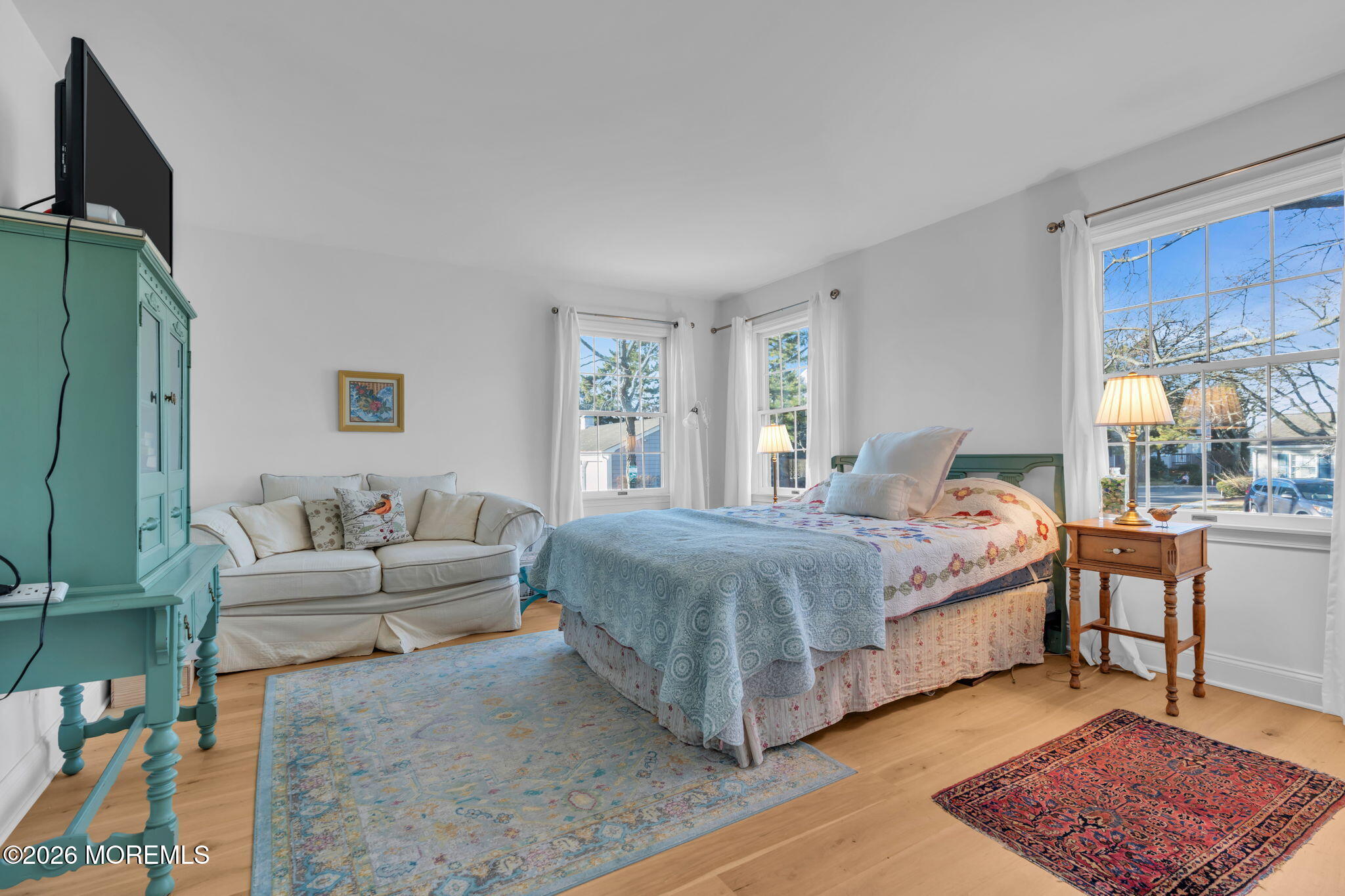 97 Bay Point Harbour Point Pleasant, NJ 08742 - Photo 28 of 54 a bedroom with a large bed and a couch