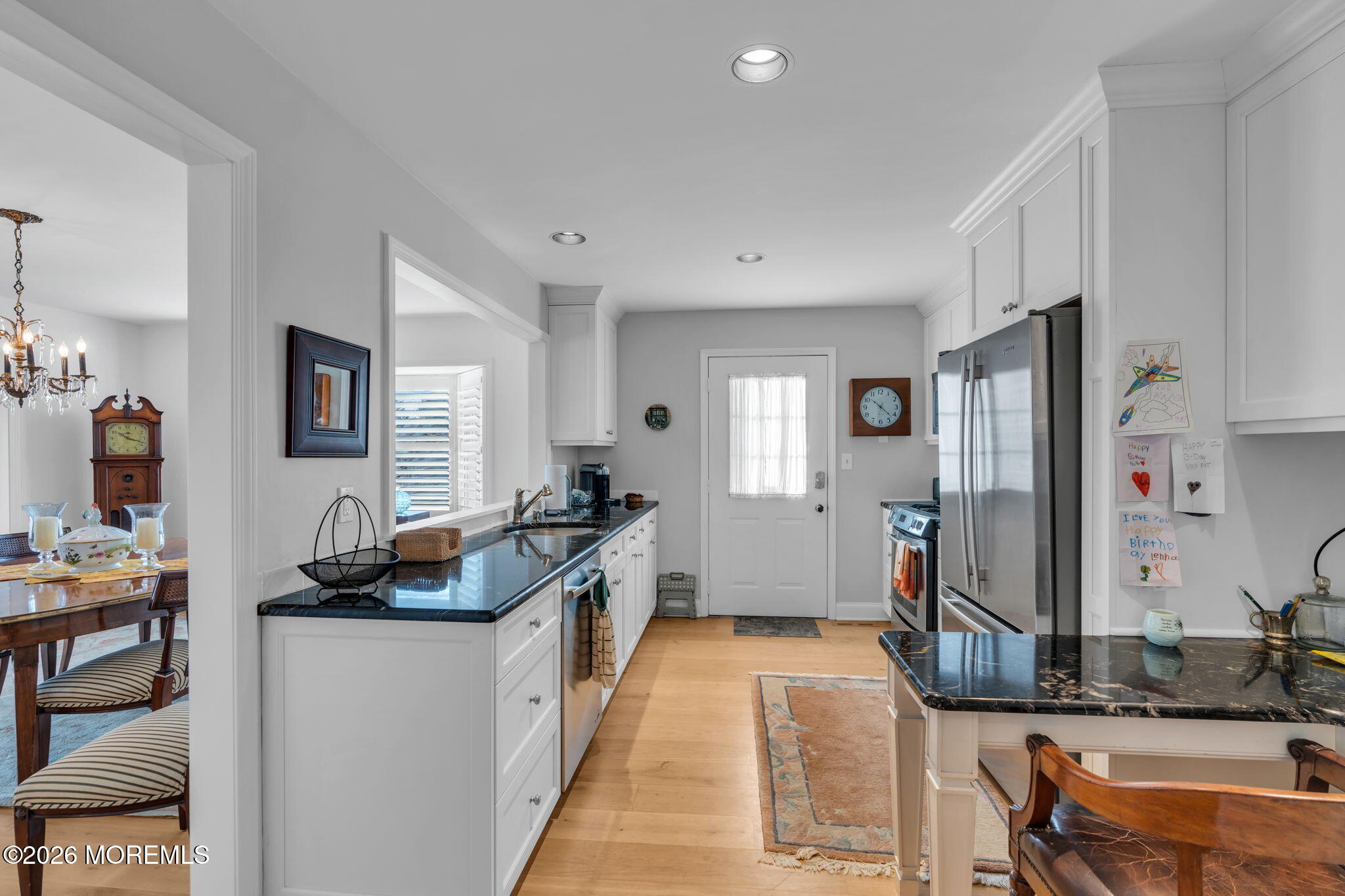 97 Bay Point Harbour Point Pleasant, NJ 08742 - Photo 7 of 54 a dining hall with stainless steel appliances granite countertop a sink a stove and a refrigerator