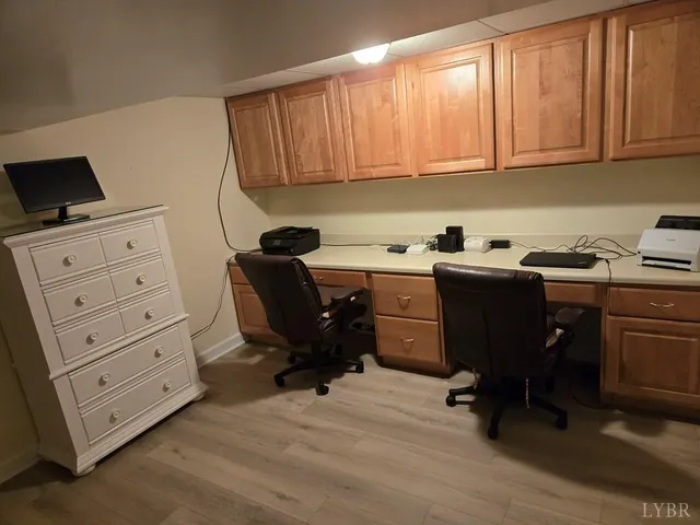 a view of workspace and cabinets