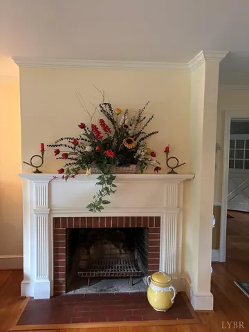 a living room with a fireplace and a fireplace
