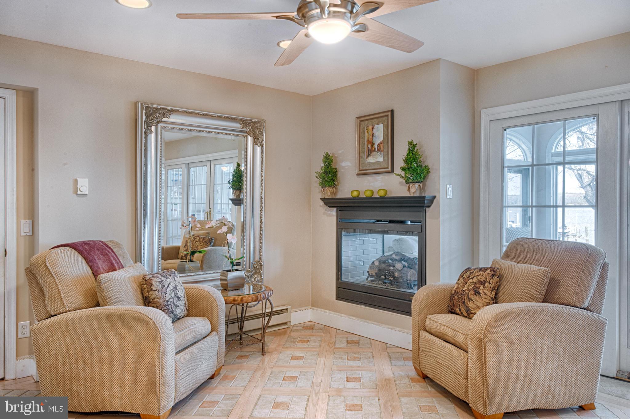 389 River Road Elkton, MD 21921 - Photo 20 of 30 Dual fireplace for sitting or dining area!