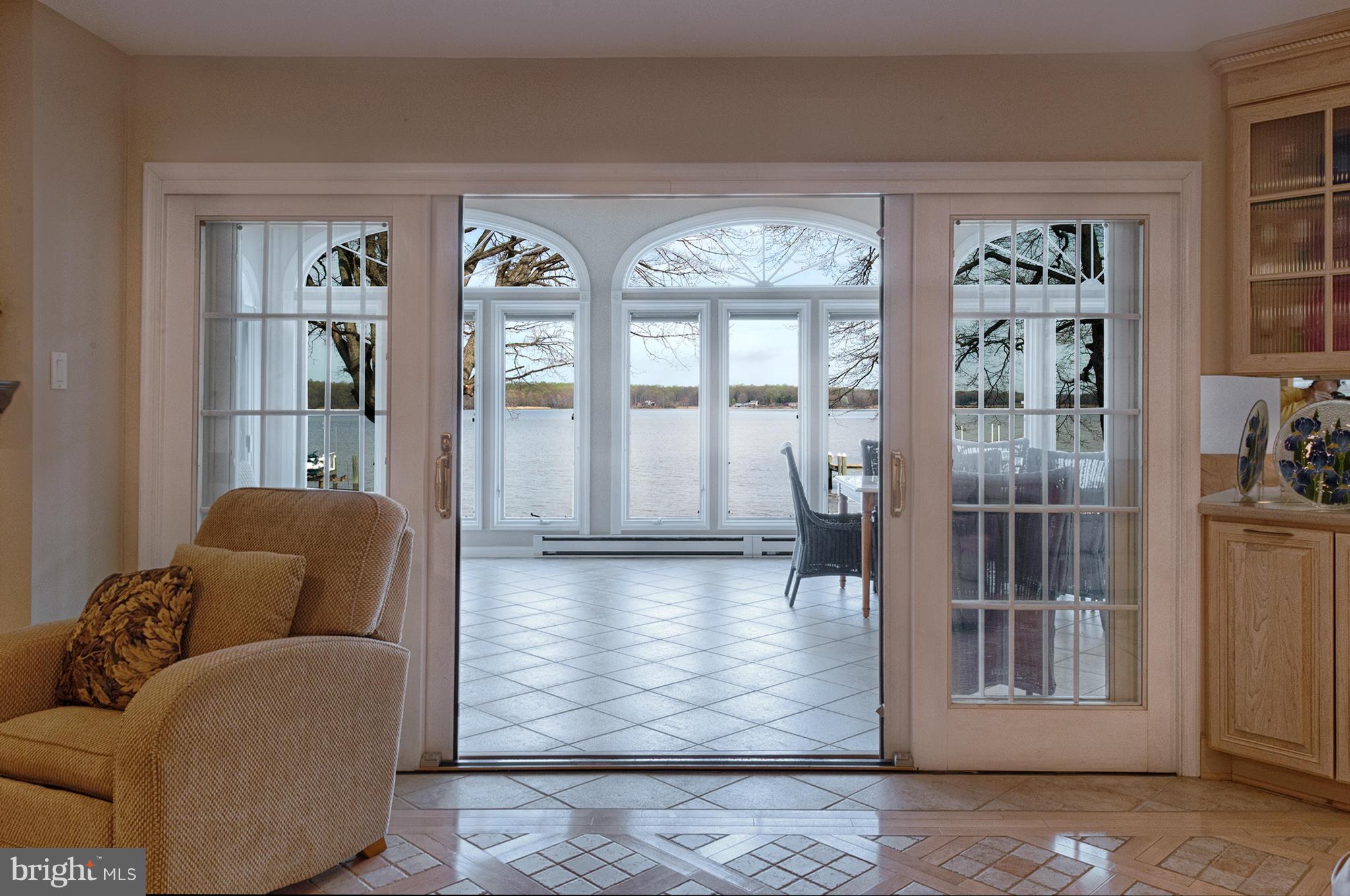 389 River Road Elkton, MD 21921 - Photo 21 of 30 Sliders to sunroom! LOOK AT THOSE WATER VIEWS!