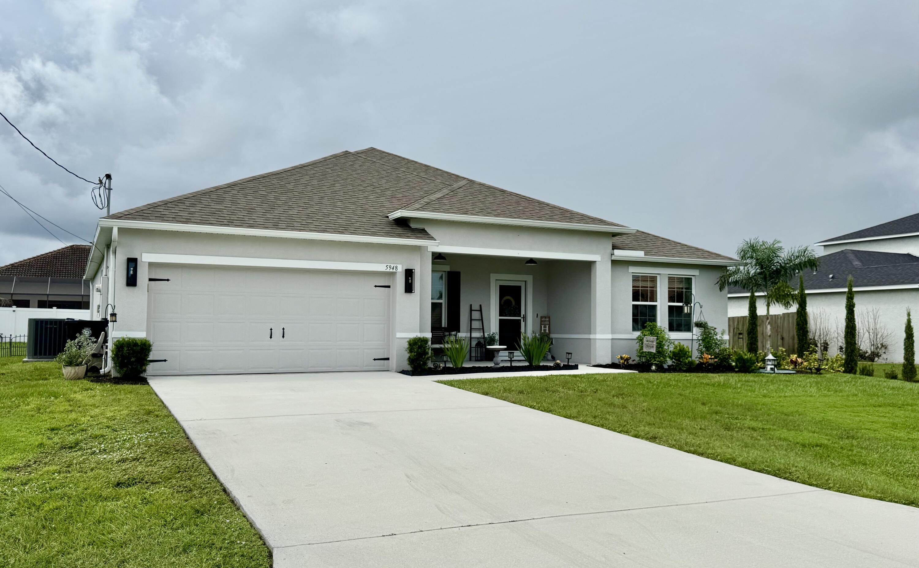 5948 Northwest Wolverine Road Port St. Lucie, FL 34986 - Photo 1 of 37 IMG_3778