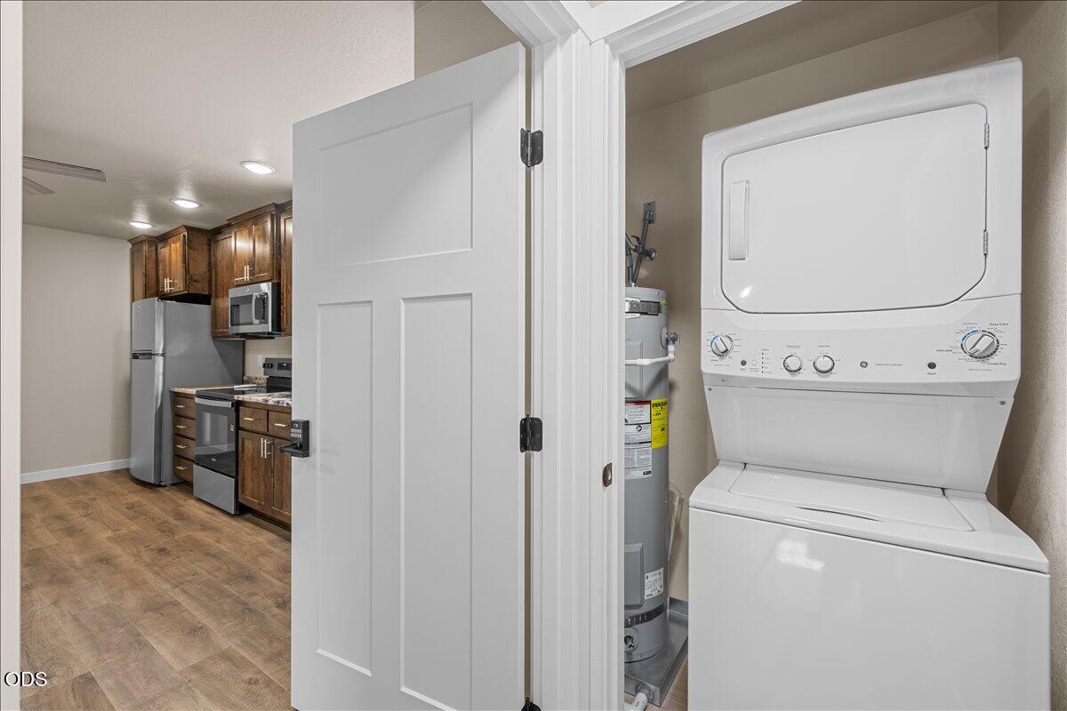 7869 Houston Loop White City, OR 97503 - Photo 10 of 15 a view of storage and utility room with washer and dryer