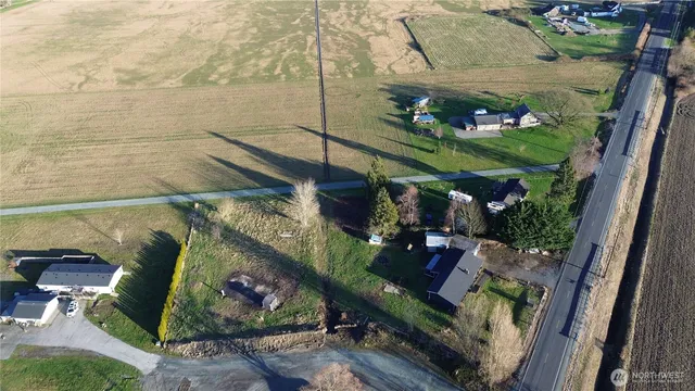 a view of swimming pool with a yard