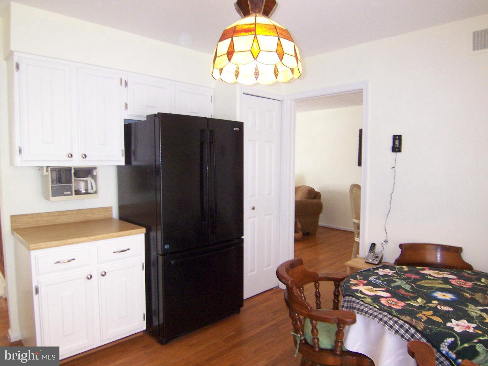 9104 Rookings Court Springfield, VA 22153 - Photo 11 of 22 a kitchen with stainless steel appliances granite countertop a refrigerator and a stove top oven