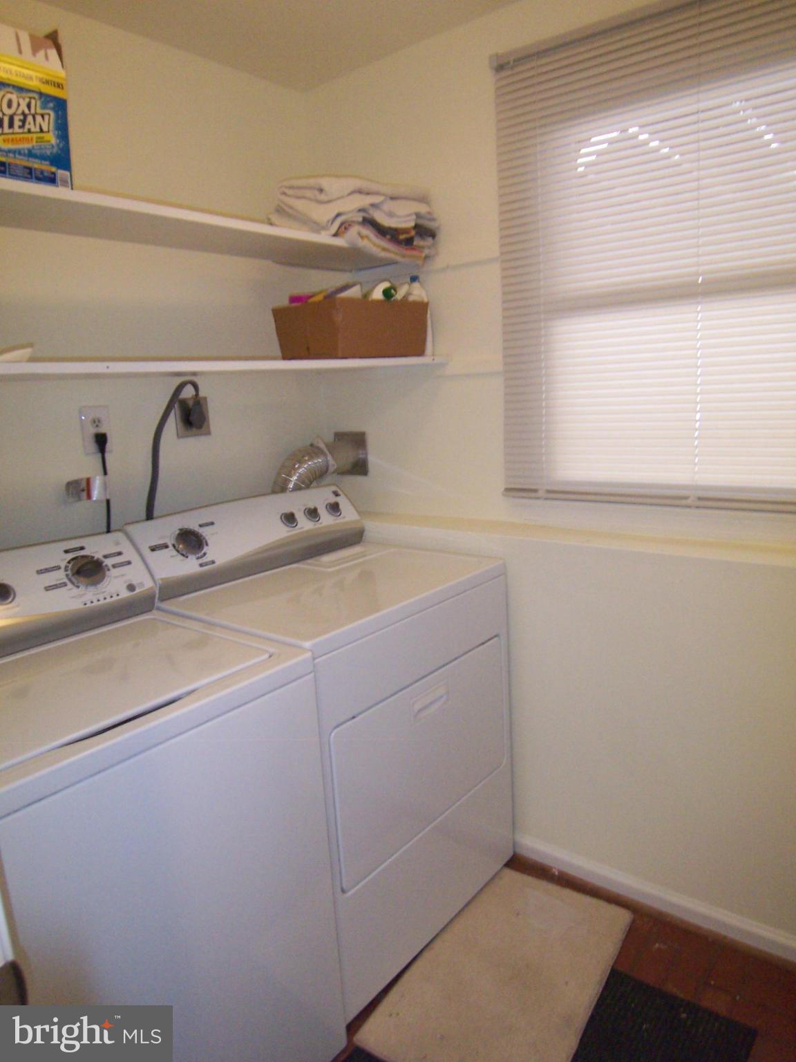 9104 Rookings Court Springfield, VA 22153 - Photo 22 of 22 a bathroom with a sink and a window
