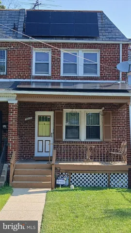 a view of a house with a large window