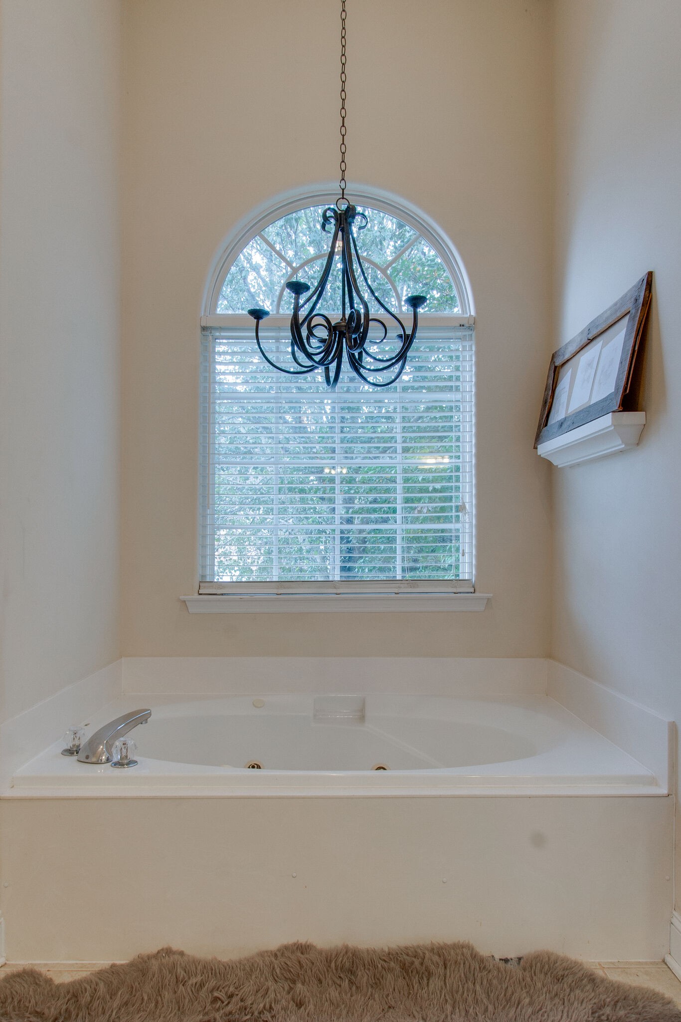 7020 Red Apple Road Antioch, TN 37013 - Photo 15 of 28 a bathroom with a bathtub and a window