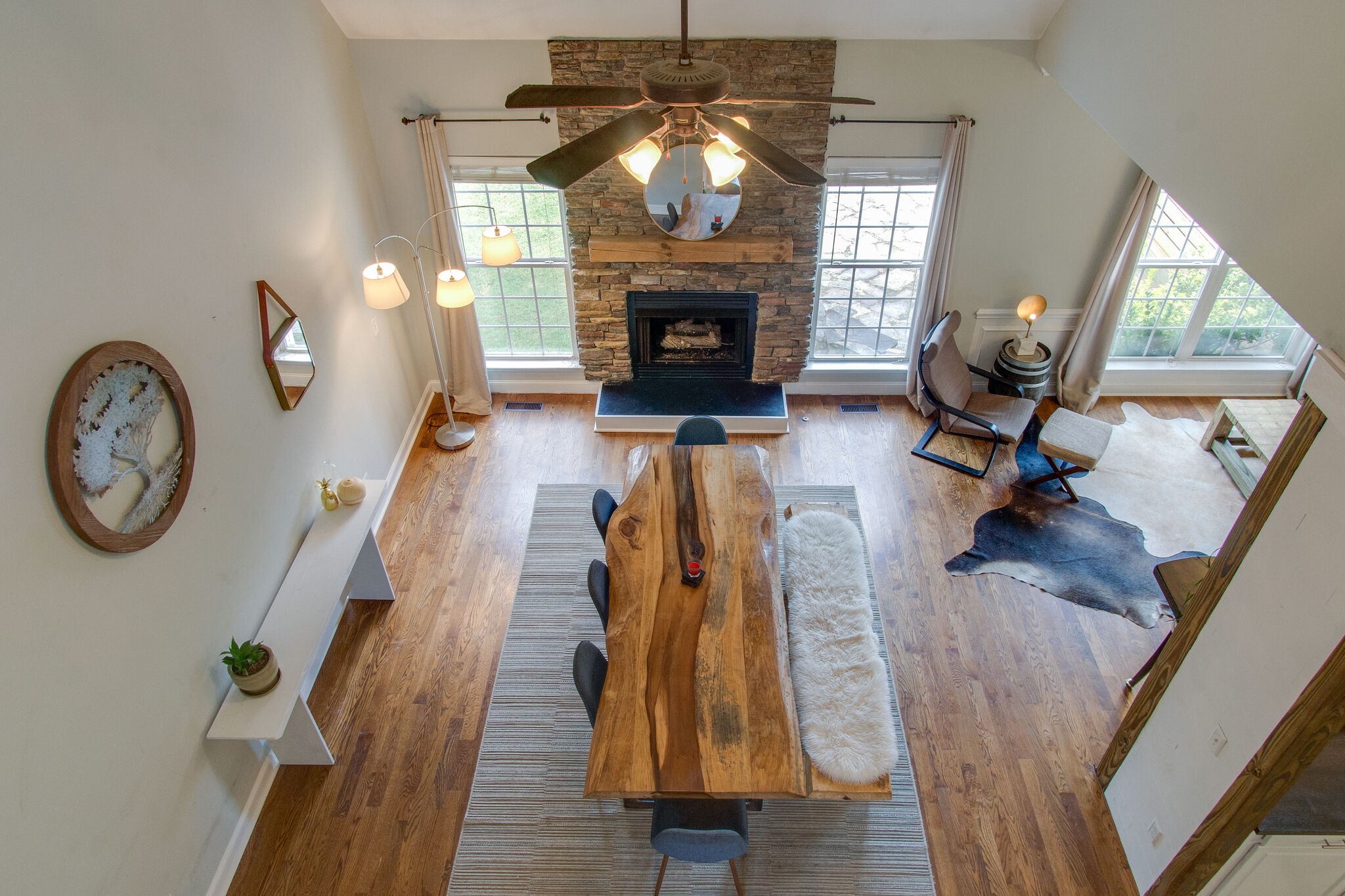 7020 Red Apple Road Antioch, TN 37013 - Photo 18 of 28 a living room with furniture a fireplace and a floor to ceiling window