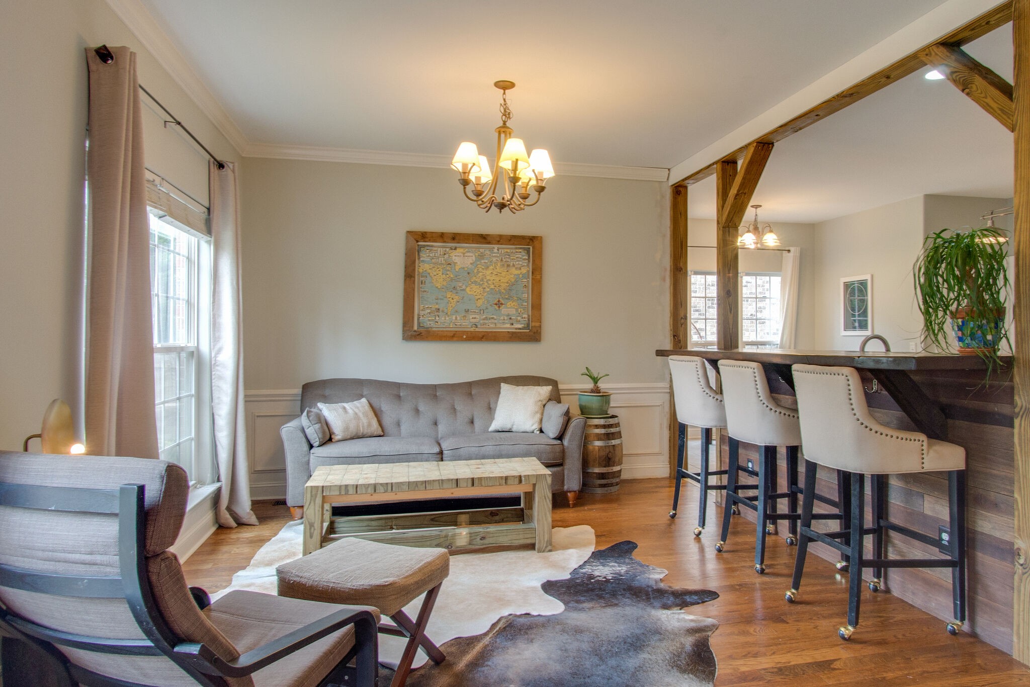 7020 Red Apple Road Antioch, TN 37013 - Photo 7 of 28 a living room with furniture dining table and a chandelier