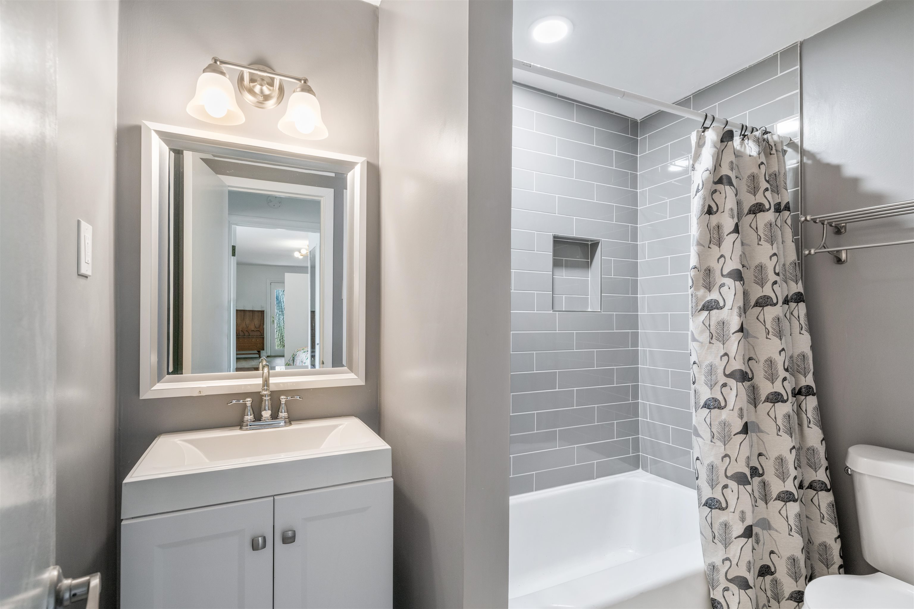 5420 Walnut Grove Road Memphis, TN 38120 - Photo 17 of 25 a bathroom with a sink toilet and shower