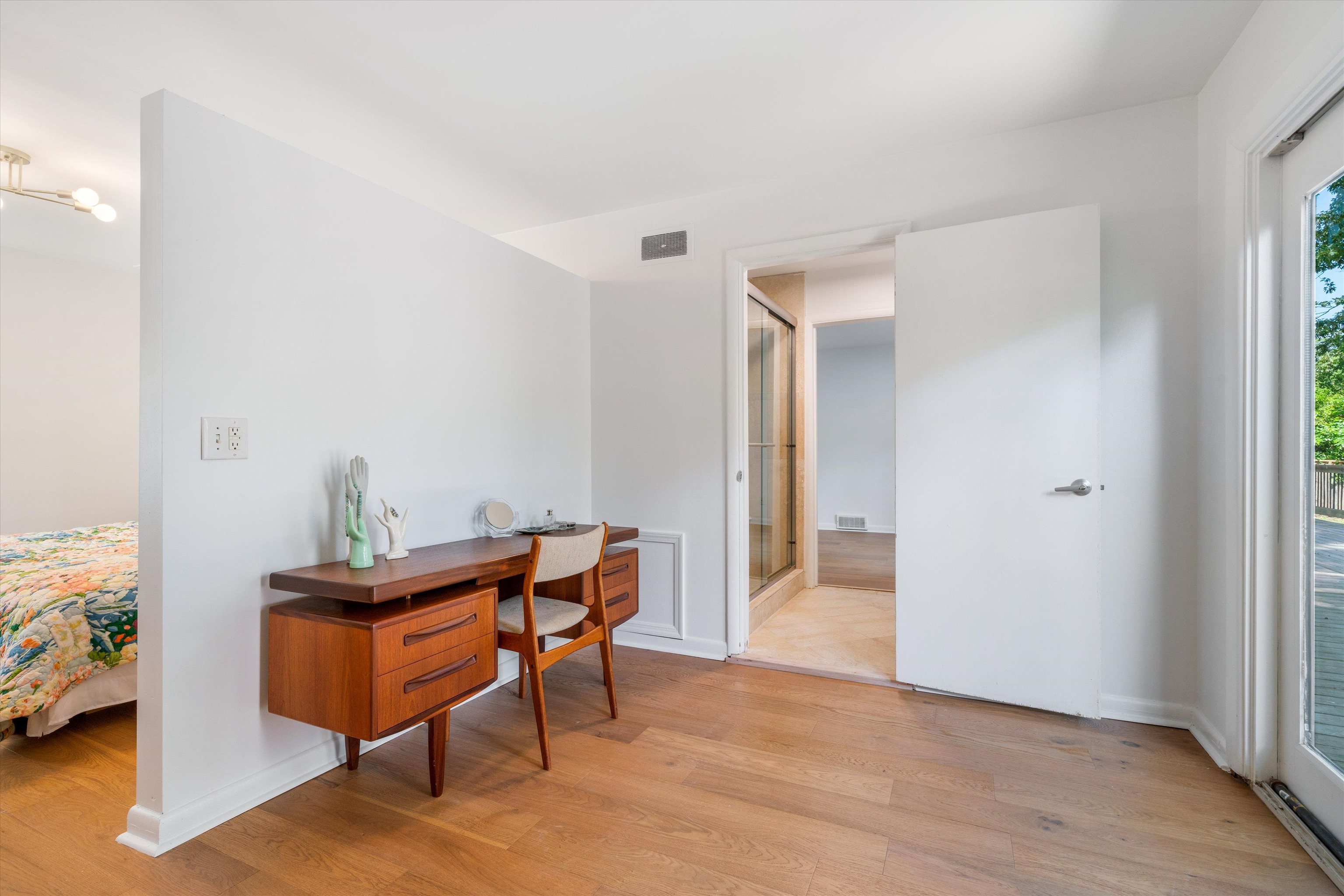 5420 Walnut Grove Road Memphis, TN 38120 - Photo 19 of 25 a view of a workspace with furniture and wooden floor