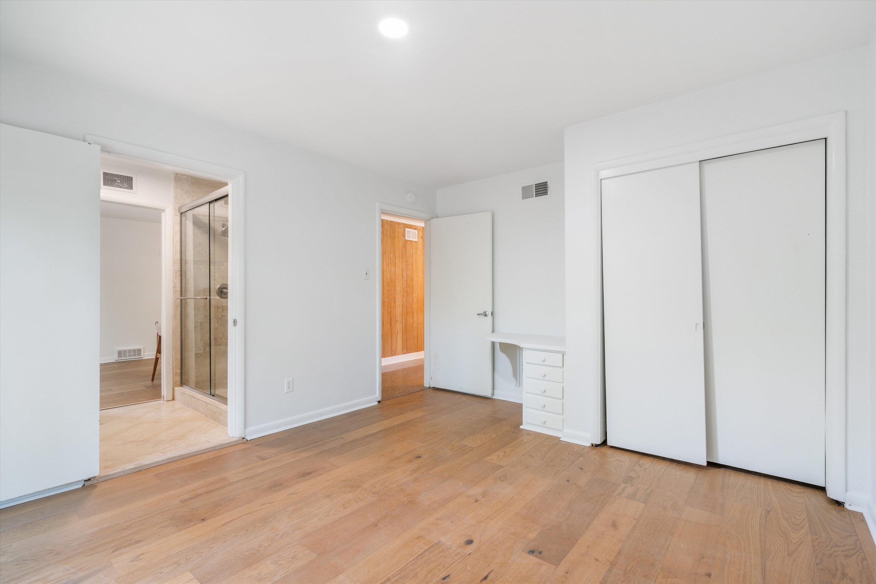 5420 Walnut Grove Road Memphis, TN 38120 - Photo 20 of 25 a view of empty room with wooden floor