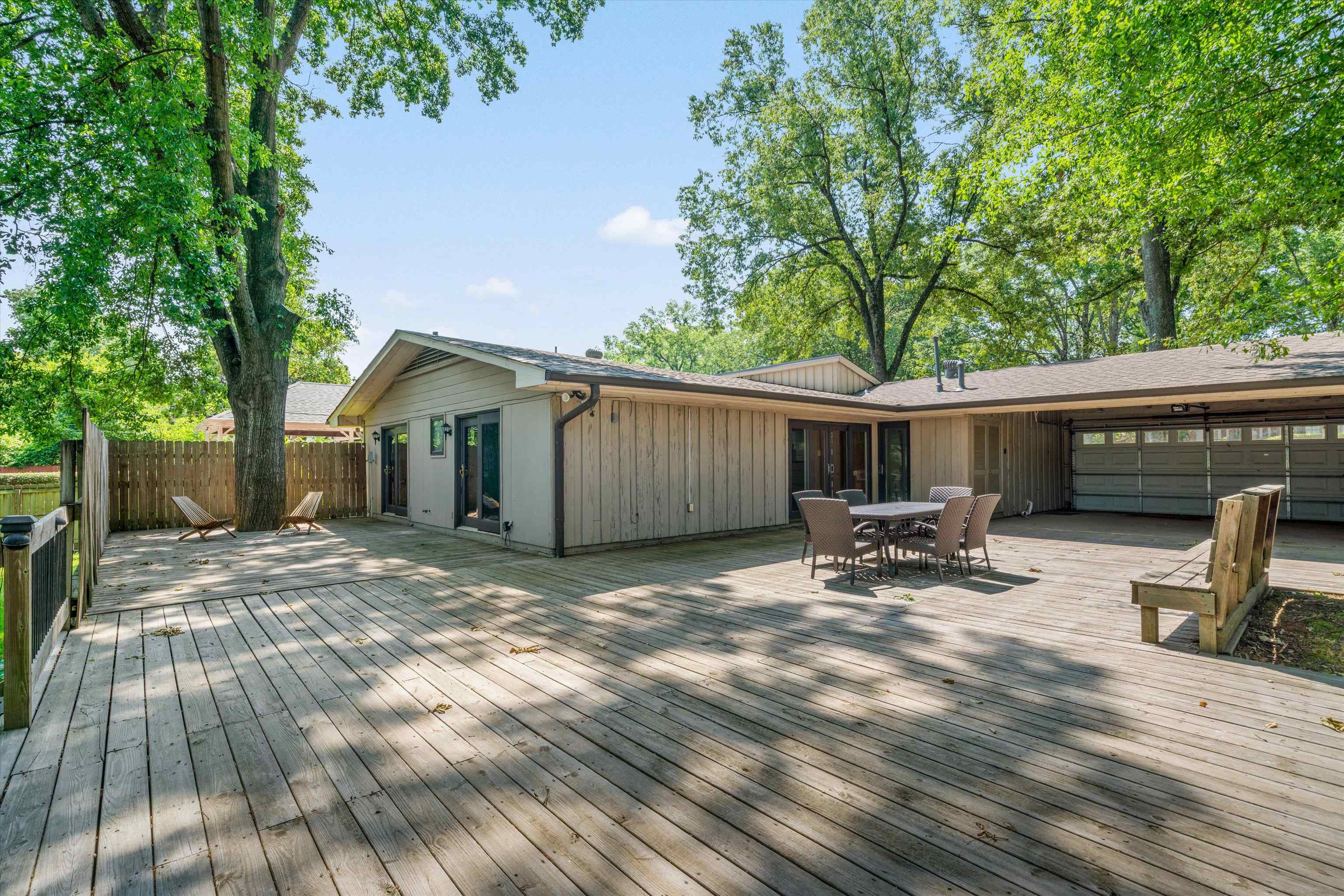 5420 Walnut Grove Road Memphis, TN 38120 - Photo 22 of 25 a view of house with backyard and sitting area