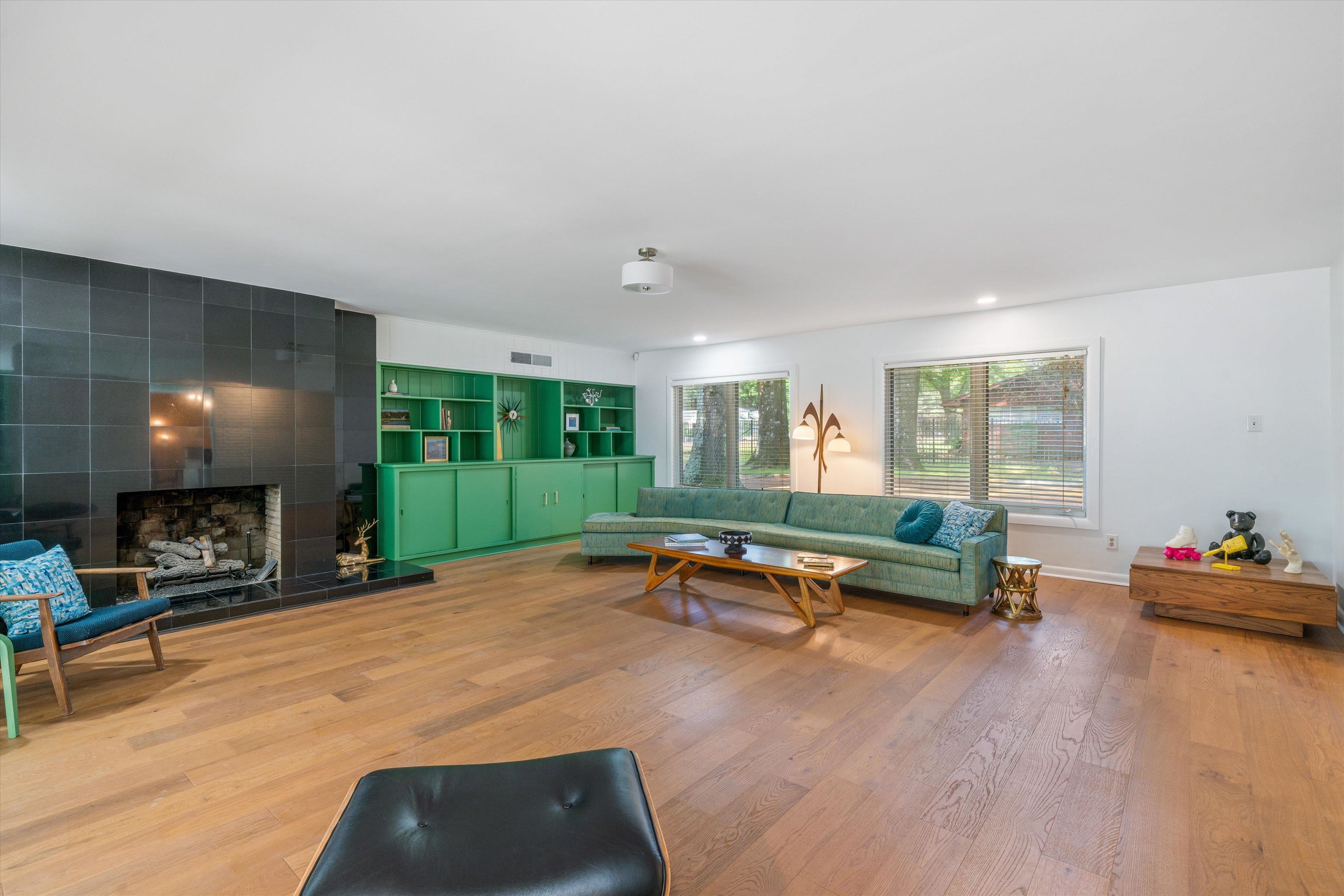 5420 Walnut Grove Road Memphis, TN 38120 - Photo 7 of 25 a living room with furniture and a fireplace